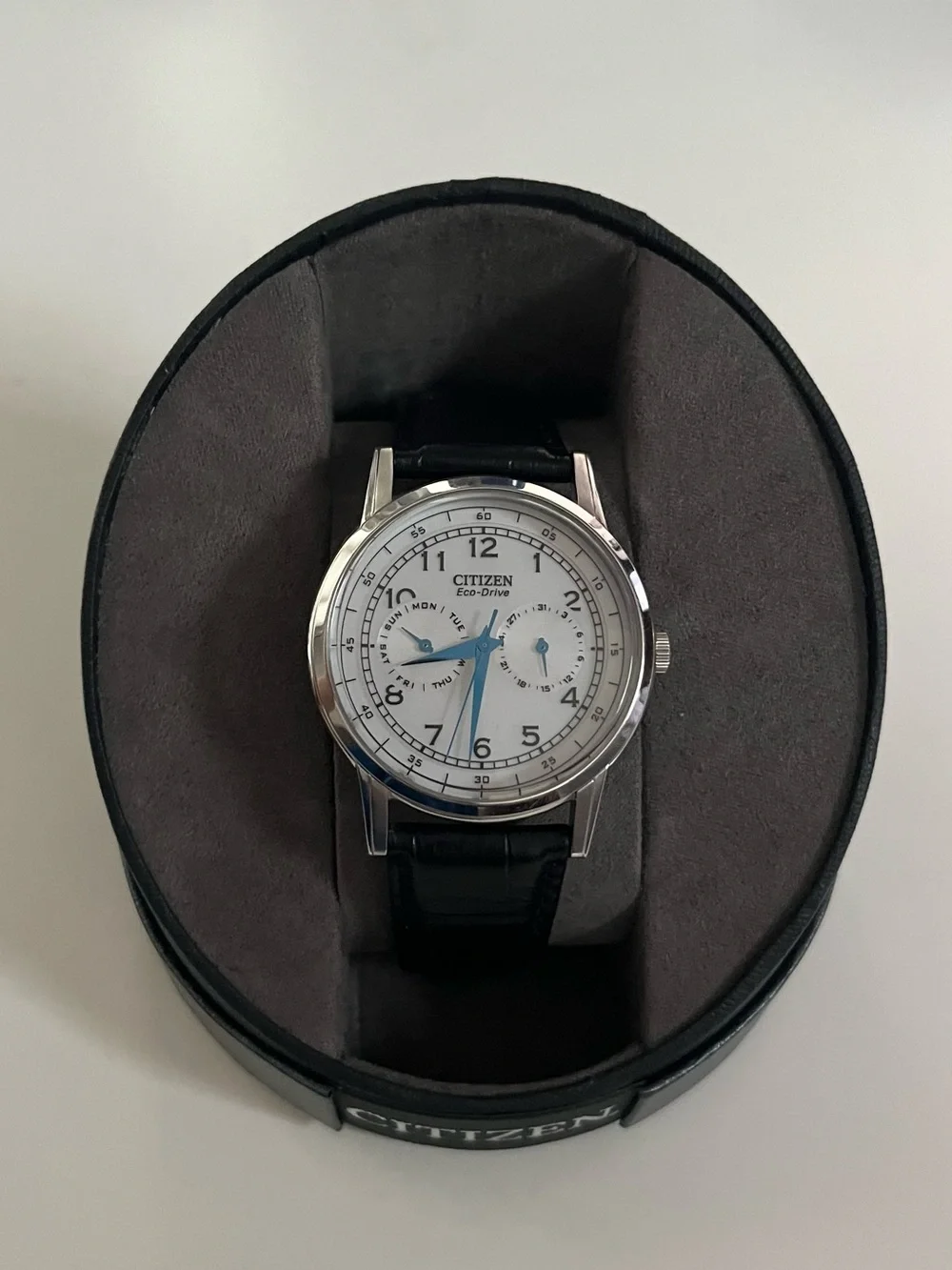 Citizen Silver Dial Watch with Blue Hands and Black Strap
